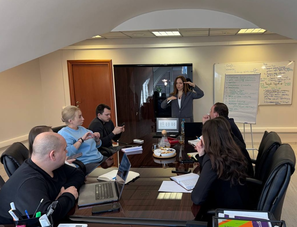 Professionals in a structured business negotiation